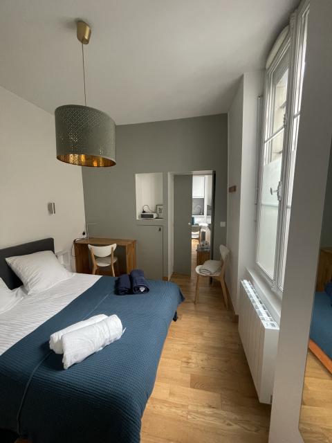 Location appartement T2 Paris 04 - Photo 5