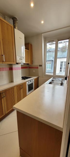 Location appartement T3 Paris 02 - Photo 3