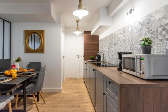 Location appartement T2 Paris 18 - Photo 1