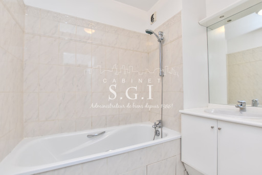 Location appartement T2 Paris 18 - Photo 3
