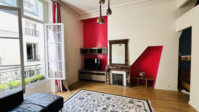 Location appartement T3 Paris 04 - Photo 1